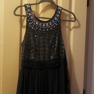 Long formal blue gown with jewels